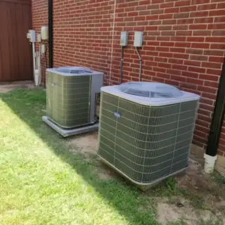 Two Carrier air conditioning units installed by McClain.