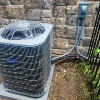 Carrier AC unit installed by McClain Heating & Air.